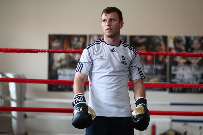 Boxer Jeff Horn stands in a boxing ring while training