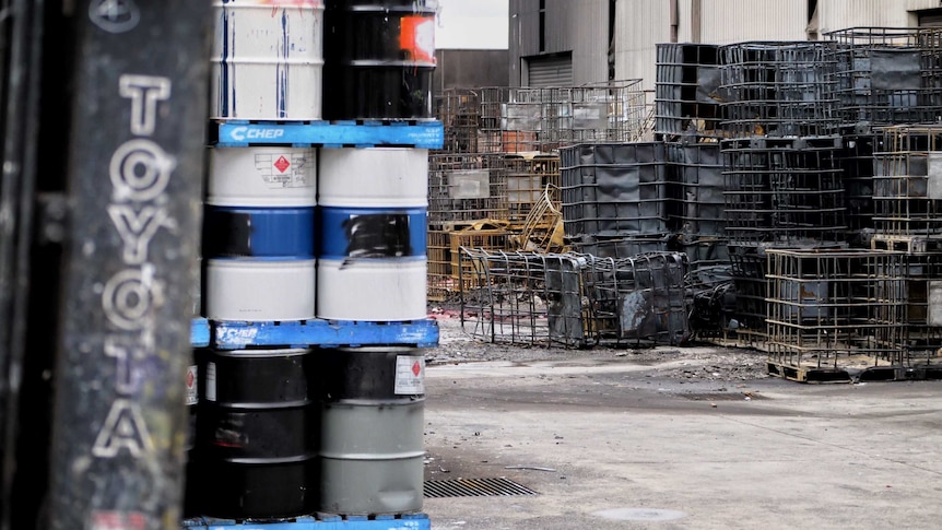 Hazardous drums and storage cages damaged by the fire at the Campbellfield factory site.