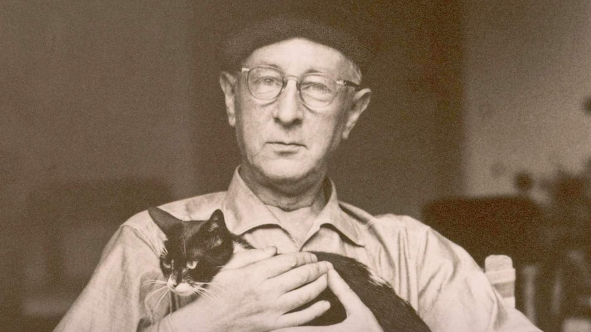 Bohuslav Martinů holding a cat.