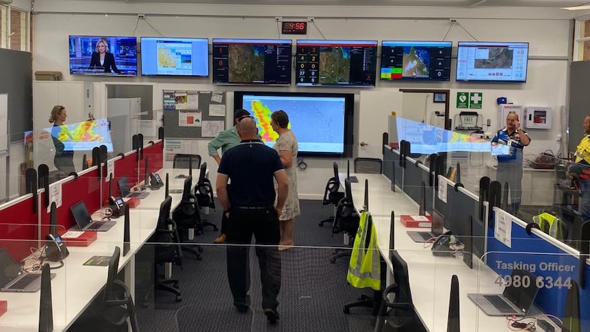 People working in a disaster management centre