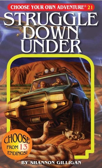 The cover of the book showing a 4WD in front of Uluru.