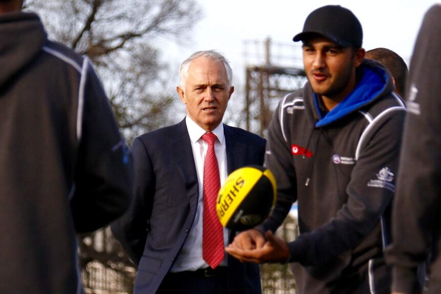 Prime Minister Malcolm Turnbull meets young AFL players in Richmond, Melbourne