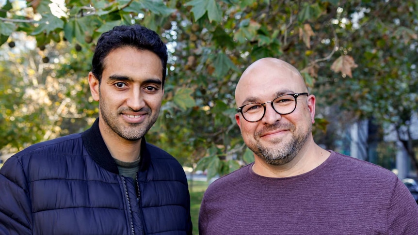 Scott Stephens and Waleed Aly pose for a photograph in Melbourne.