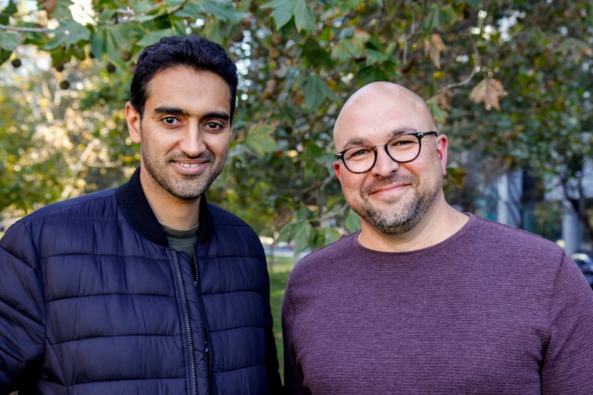 Scott Stephens and Waleed Aly pose for a photograph in Melbourne.