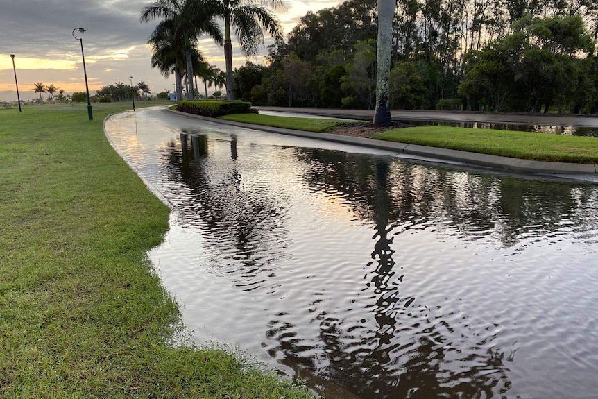 Water across the road near Calypso Bay canal development at Jacobs Well.