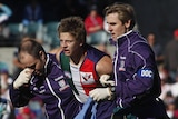 Damaging clash: Nathan Fyfe was involved in a head clash with team-mate Dylan Roberton and didn't return to the fray.