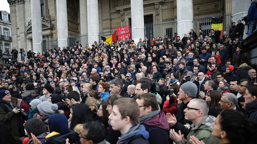 People hold a minute of silence in Brussels.