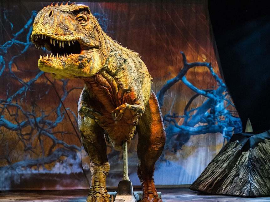 A robotic Tyrannosaurus Rex roars as part of the Walking with Dinosaurs production.