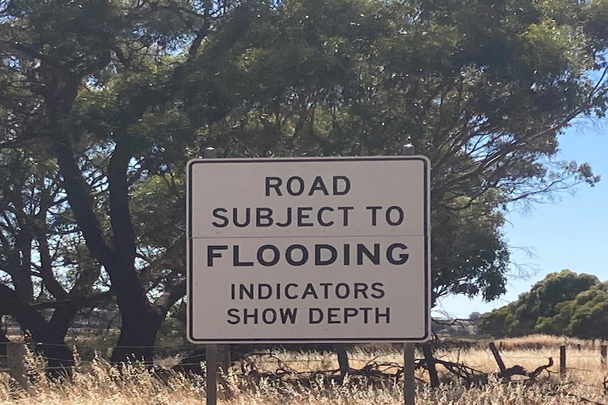 Sign warning people of flooding