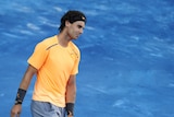 Grouchy smurf: Nadal continued to show his displeasure with the slippery, blue clay in Madrid.