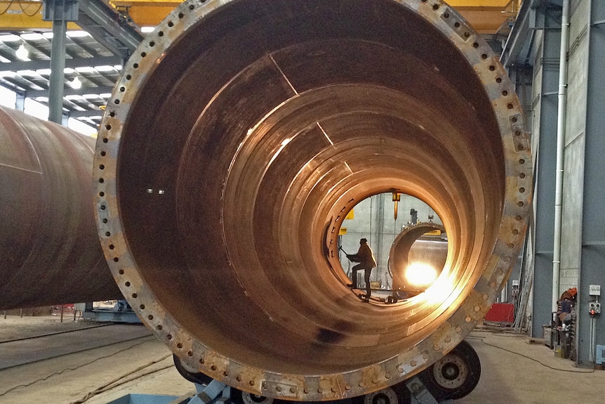 A worker inside a tower at the Musselroe wind farm site in Tasmania