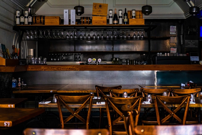 The dark interior of an Italian restaurant.