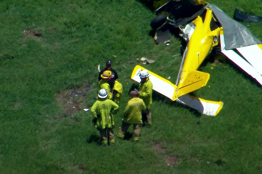 aerial view of a crashed yellow plane