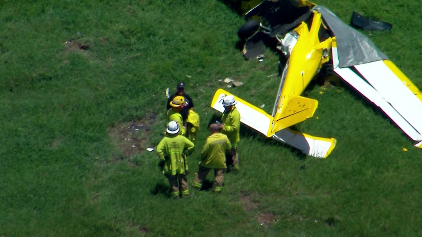 aerial view of a crashed yellow plane