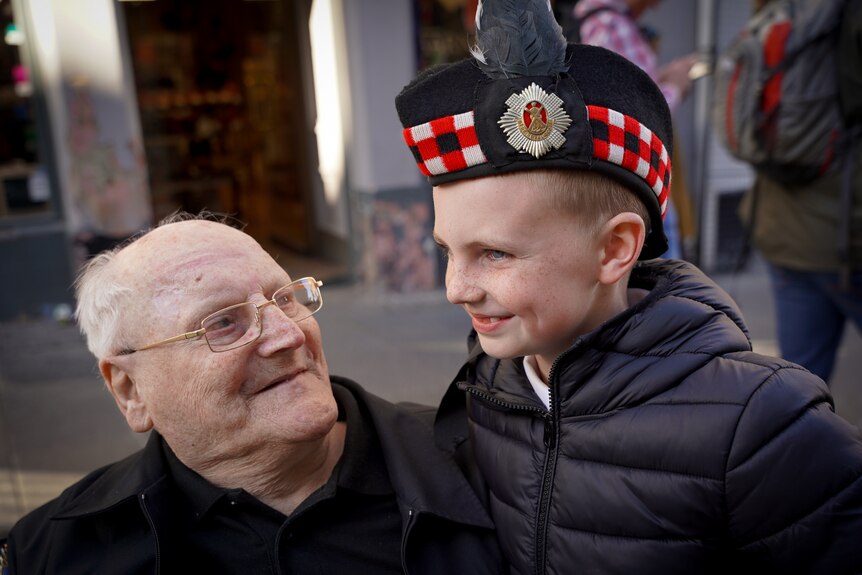 Hector and his grandon Leo, who is wearing Hector's Royal Scots cap