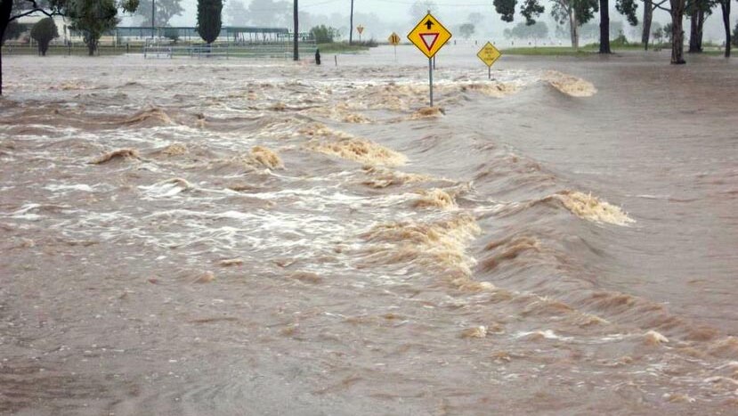 Floodwaters rage through Monto.