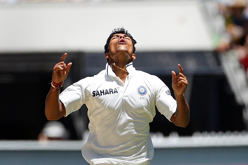 India's Umesh Yadav celebrates taking a wicket