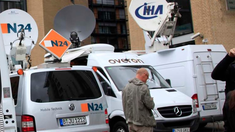 Journalists wait outside Oslo District Court in Norway