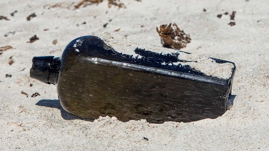 The 19th-century gin bottle was found north of Perth with a damp, rolled up piece of paper inside.