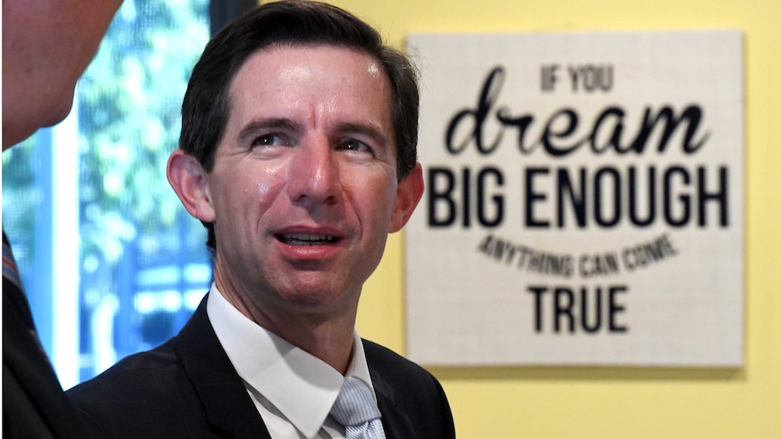 Simon Birmingham next to 'If you dream big enough anything can come true'