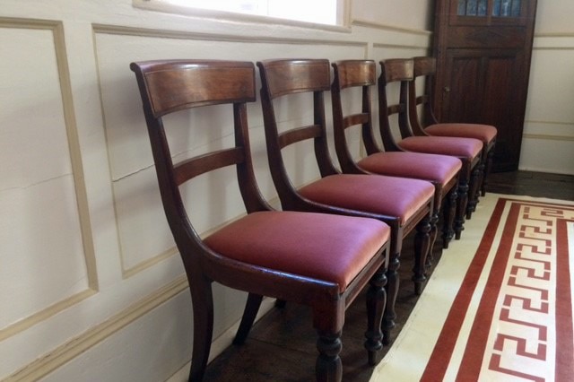 A line of chairs in the Private Secretary's Cottage