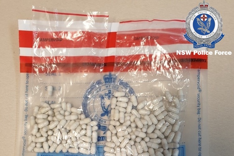 a packet of pills confiscated by new southw ales police after they conducted operations at two sydney music festivals
