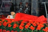 Korean Central TV still of Kim Jong-il's body lying in a glass coffin in Pyongyang on December 20, 2011.