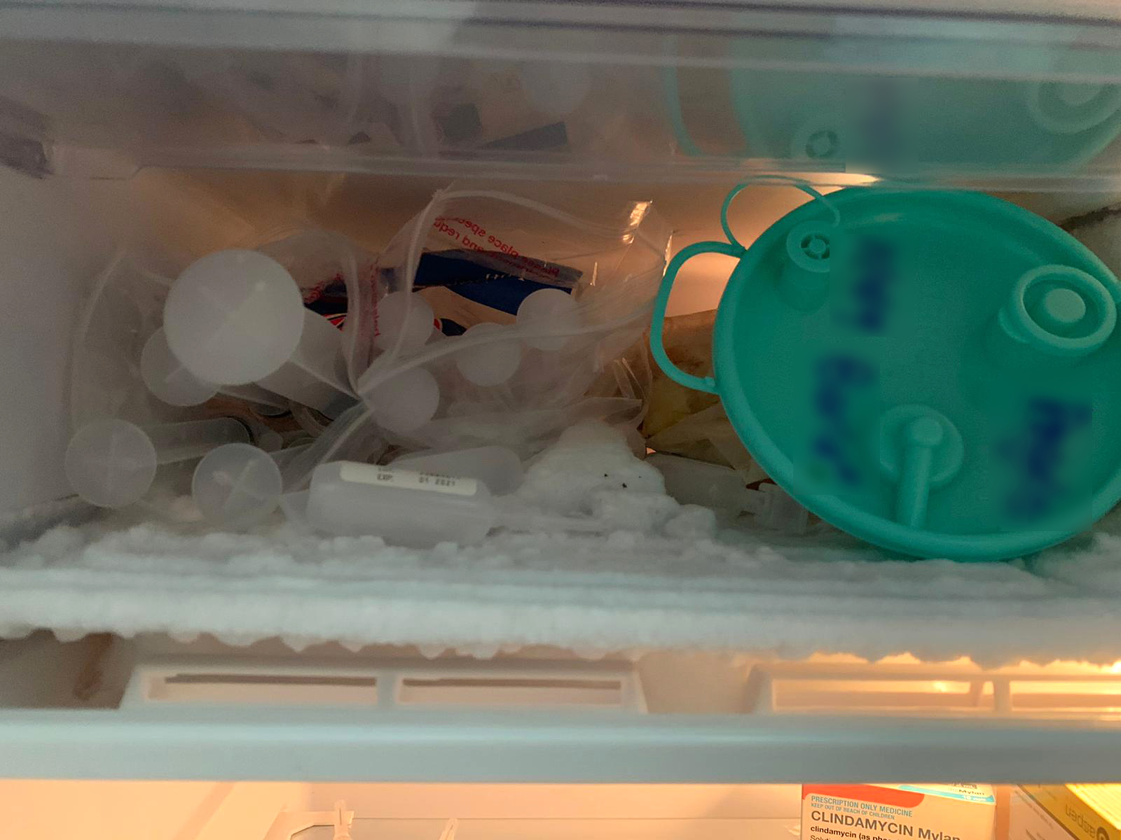 A photo shows syringes in a fridge at a Dr Lanzer clinic.