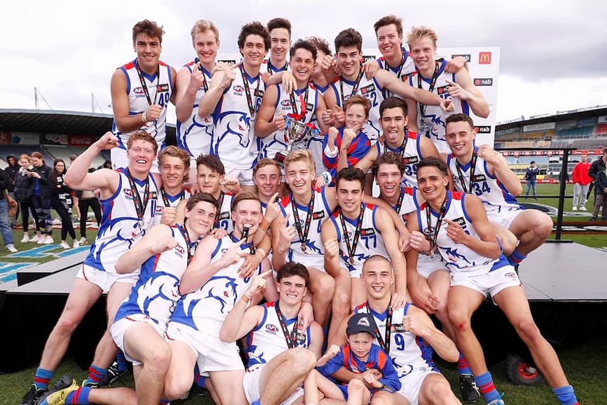 Footballers cheering after a win