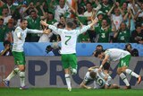 Ireland players celebrate Robbie Brady's winner against Italy