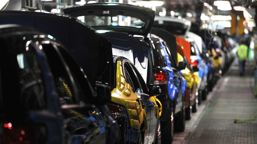 New cars on the assembly line at the Ford Manufacturing Plant in Broadmeadows.