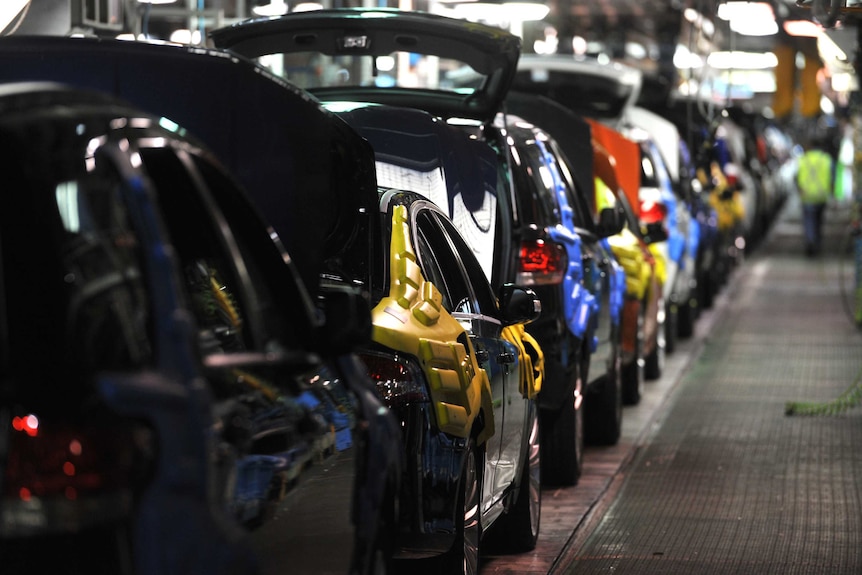 New cars on the assembly line at the Ford Manufacturing Plant in Broadmeadows.