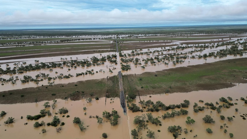 an aerial fo an outback flooded road