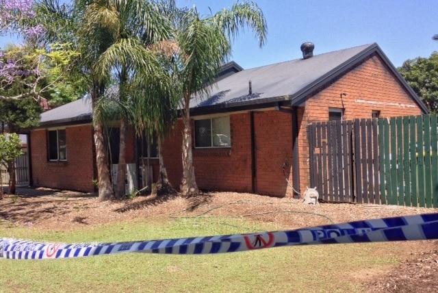 House with police tape outside at Waterford West, south of Brisbane.