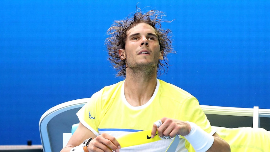 Shock exit ... Rafael Nadal gathers his thoughts during his first-round match against Fernando Verdasco