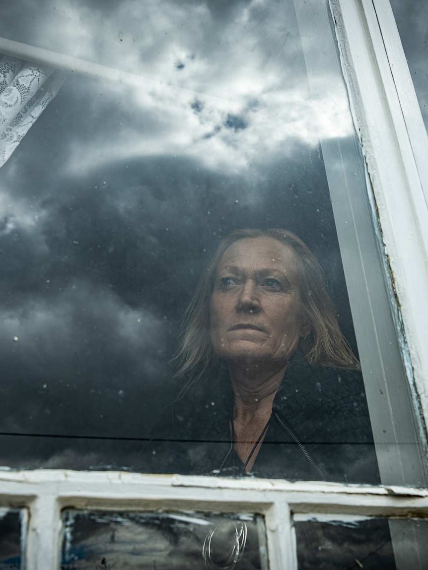 Donna Dickson looks out the window of her home in Armidale.