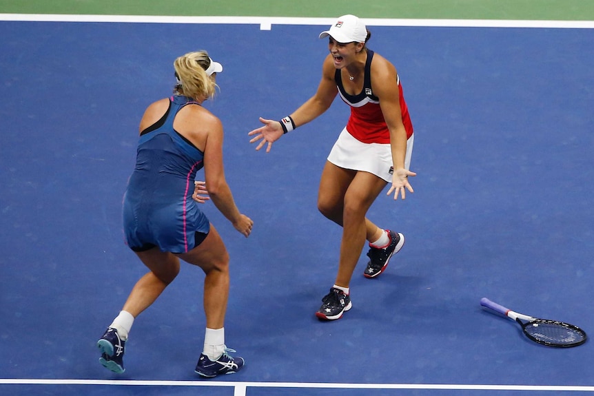 Ash Barty and CoCo Vandeweghe celebrate doubles victory