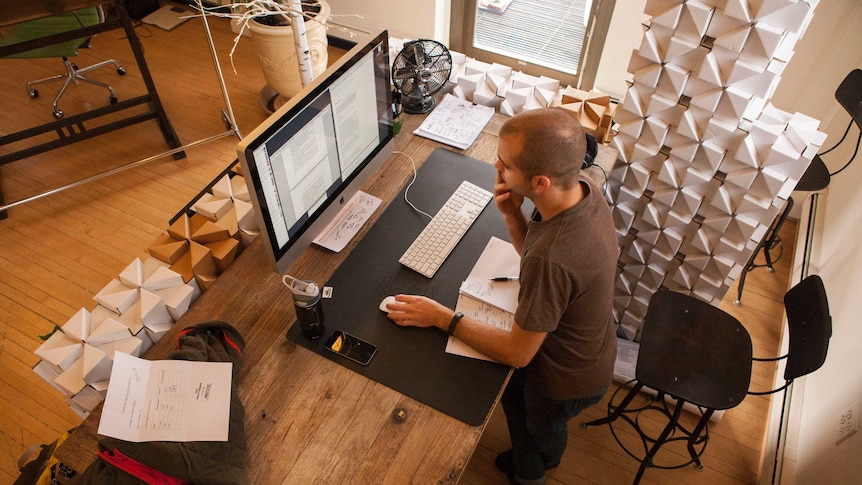 Working at a standing desk may assist with increased productivity.