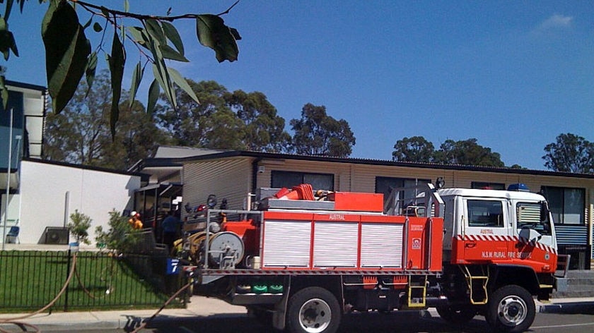 A fire truck parks outside Unity Grammar School in Austral