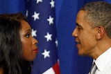 Barack Obama greeted by singer Jennifer Hudson