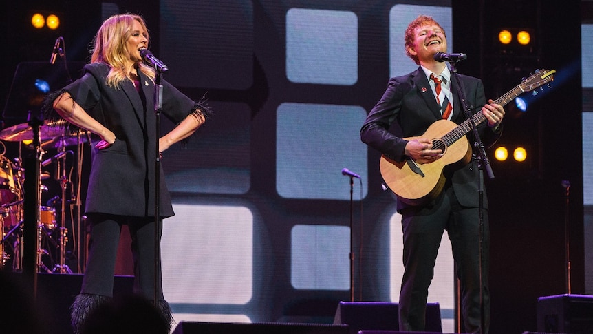 Kylie Minogue and Ed Sheeran on stage at the Michael Gudinski State Memorial in March 2021
