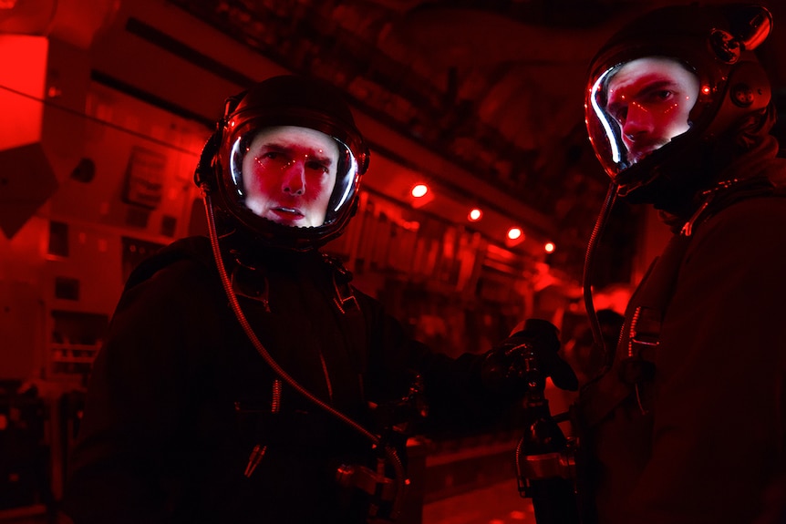Still image of Tom Cruise and Henry Cavill dressed in high-altitude thermal suits in 2018 film Mission Impossible: Fallout.