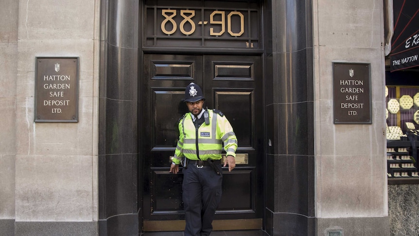 Police officer leaves safe deposit building in London