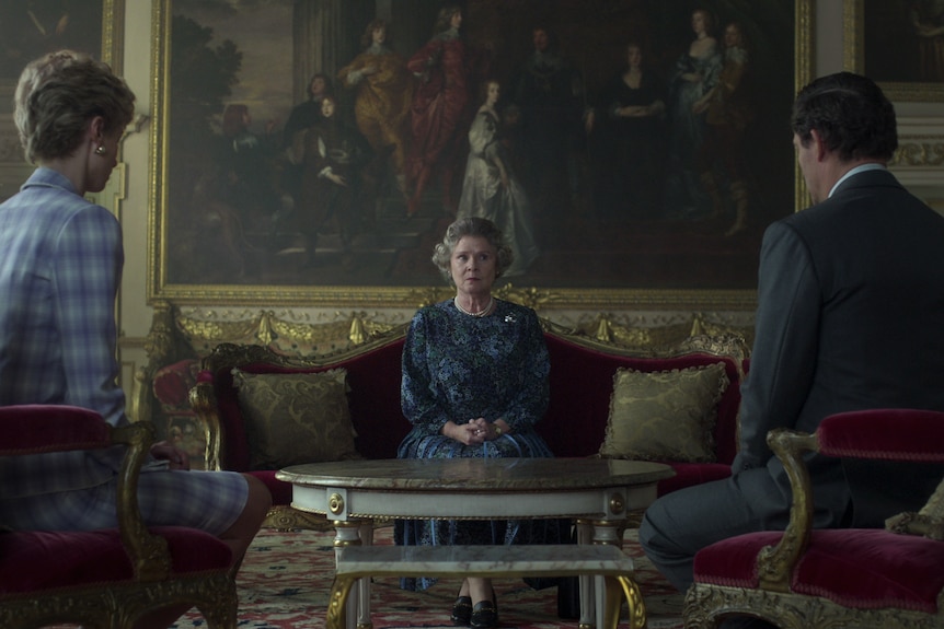 Princess Diana and Prince Charles meet with Queen Elizabeth II.