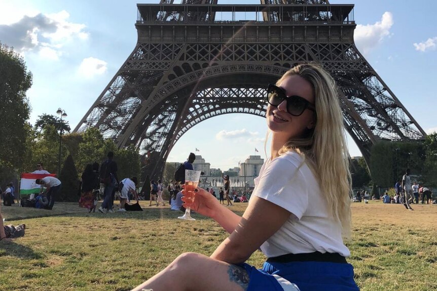 Maria at the Eiffel Tower.