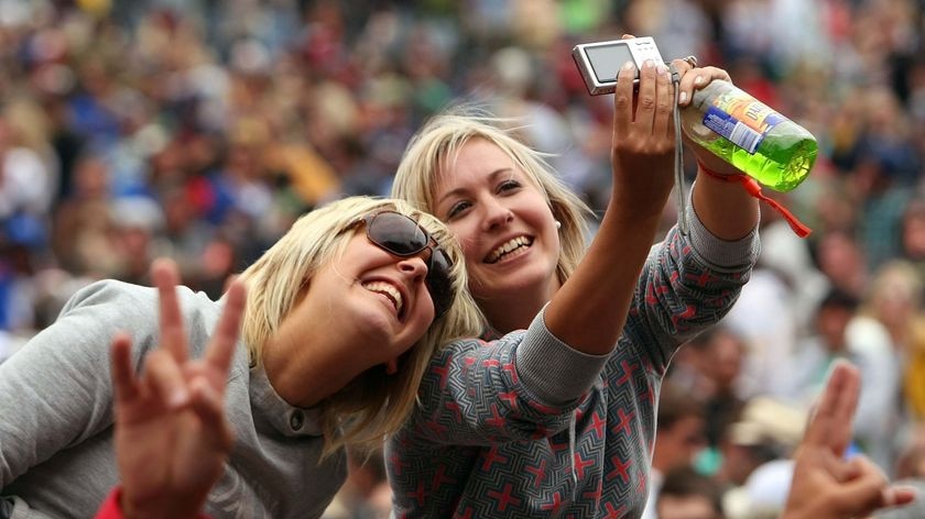 Two festival goers take a self-portrait at The Falls Festival