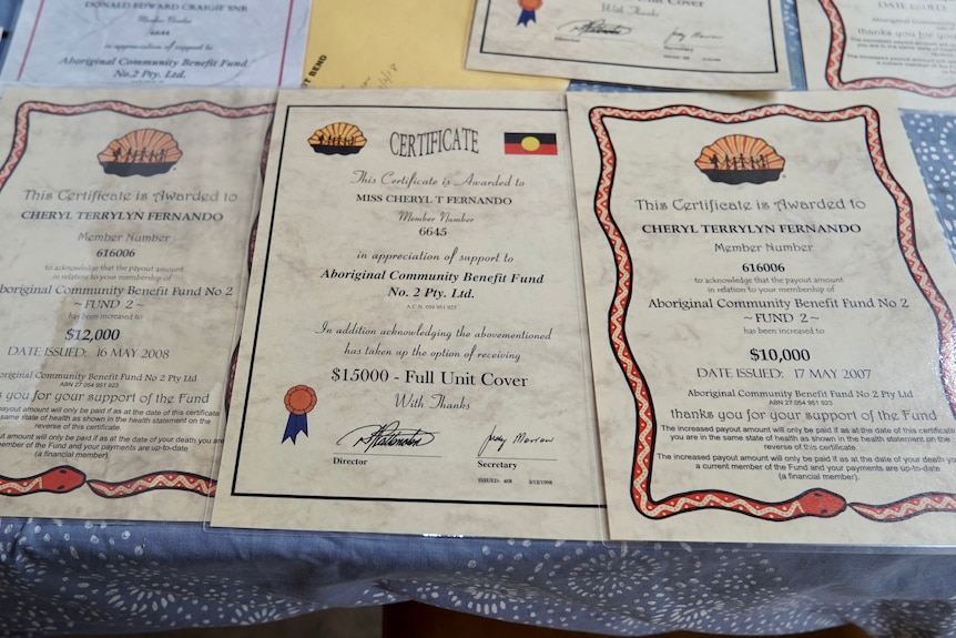 Three ACBF certificates, showing she is covered for $10,000, 12,000 and 15,000.