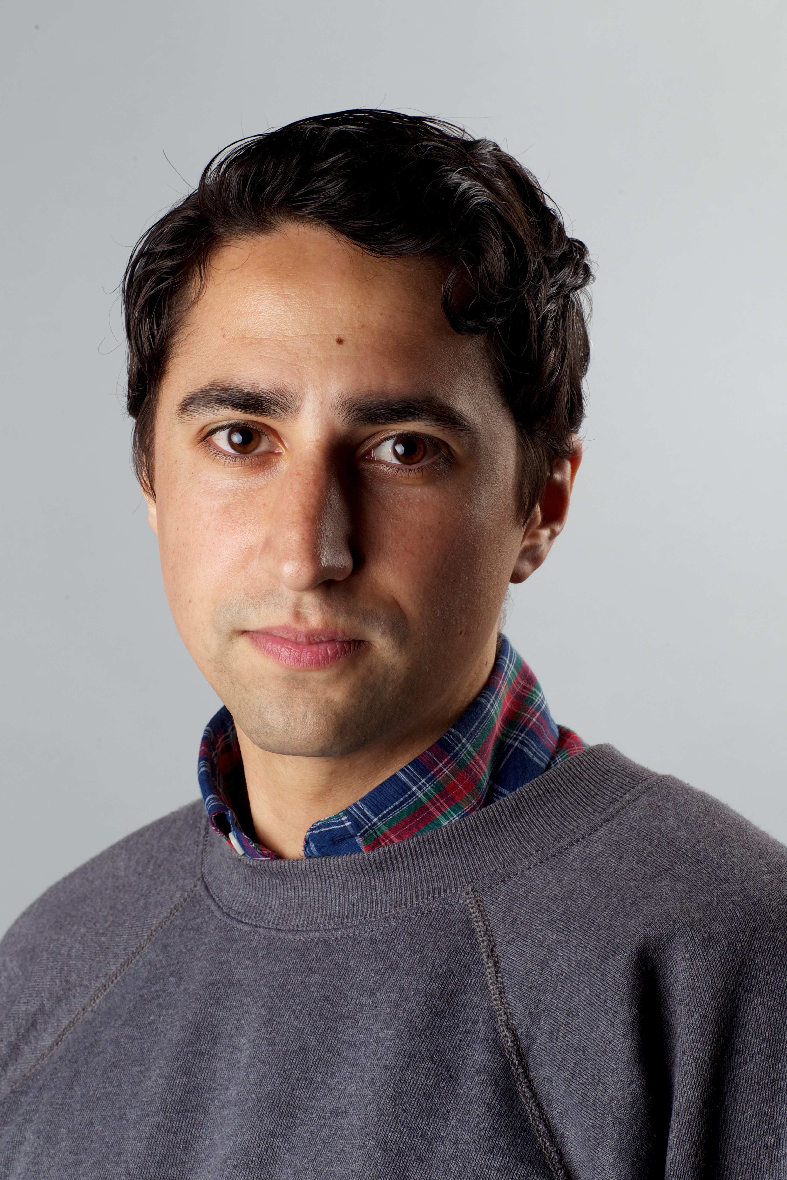 A middle-aged man with dark hair.