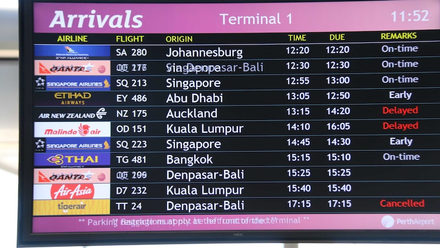 Cancelled Tigerair flight to Bali shown on board at Perth airport.