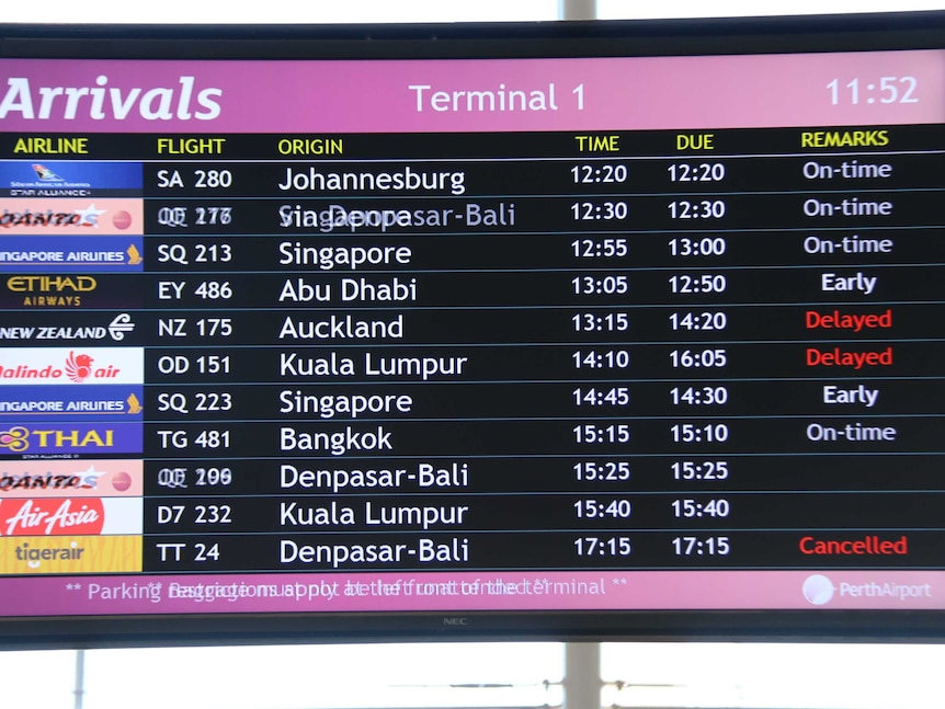 Cancelled Tigerair flight to Bali shown on board at Perth airport.